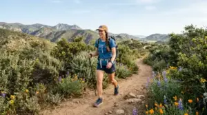 Hiker walking on dirt trail